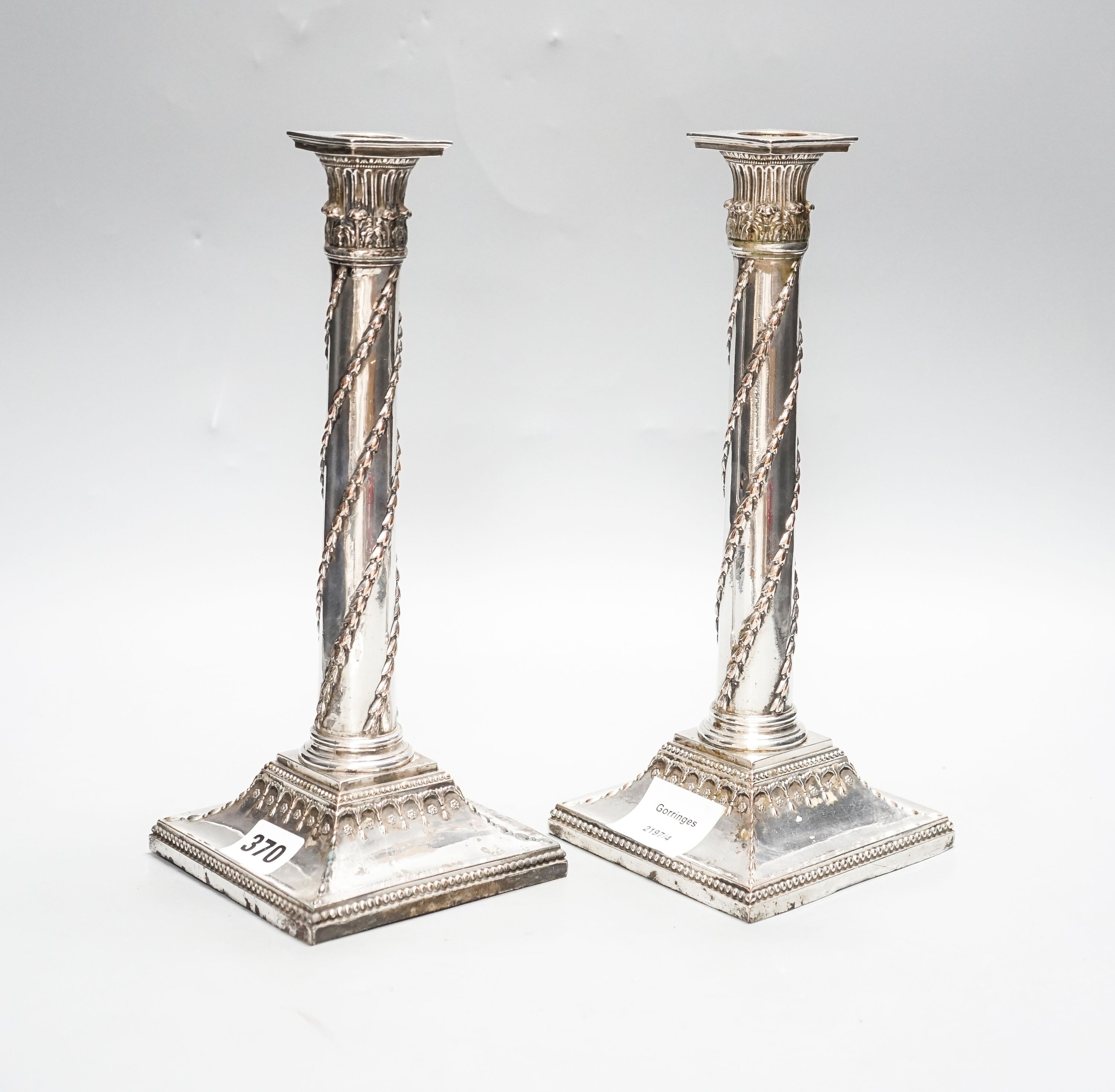 A pair of Victorian electroplate Corinthian column candlesticks, 28.5cm